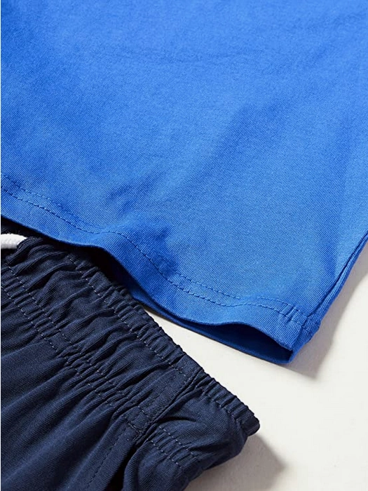 Slim Silhouette Bold Look Champion completino da ragazzo Legacy Graphic T-shirt + Bermuda 306315 BS071 ETR bluette-navy