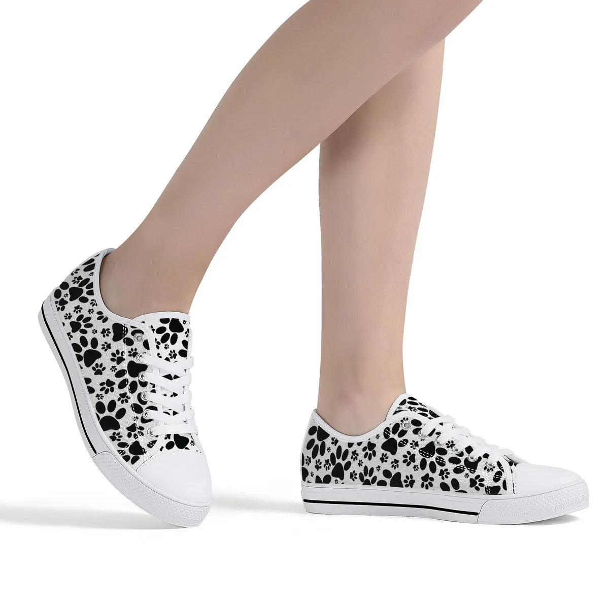 Stealthy Tracks: Black Animal Paw Prints Canvas Sneakers