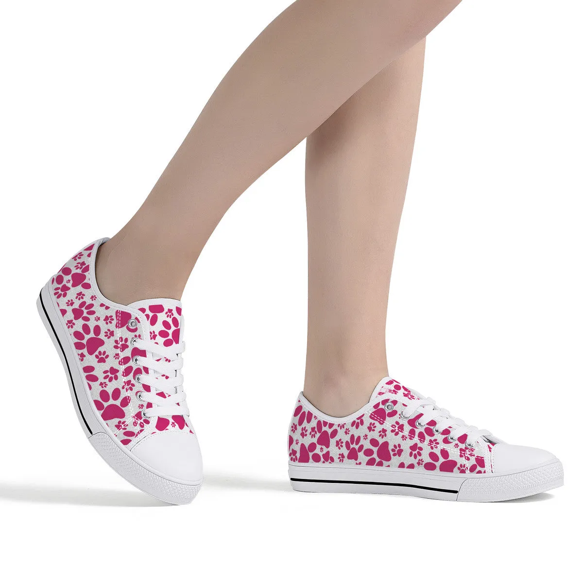 Vibrant Tracks: Hot Pink Animal Paw Prints Canvas Sneakers